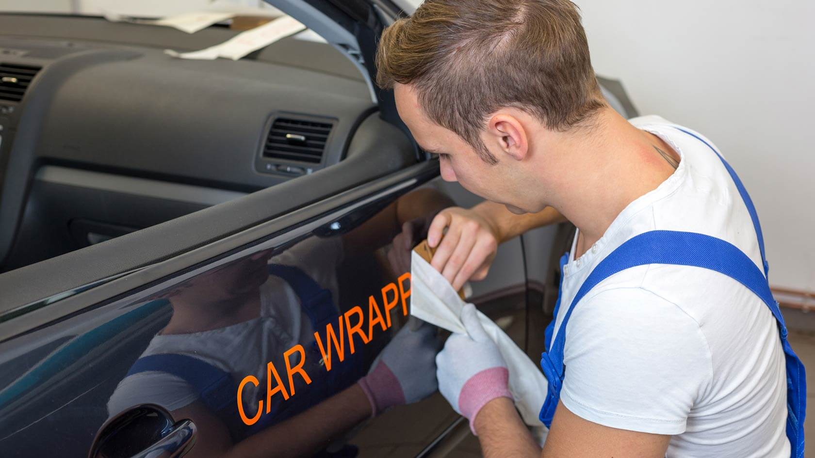 man doing car-wrapping-business