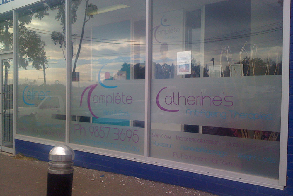 business window frosting signage
